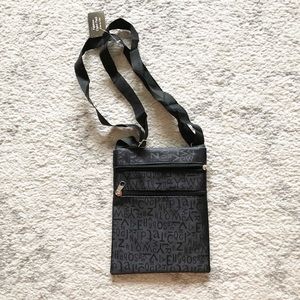 Black canvas “Alphabet” traveling chest bag